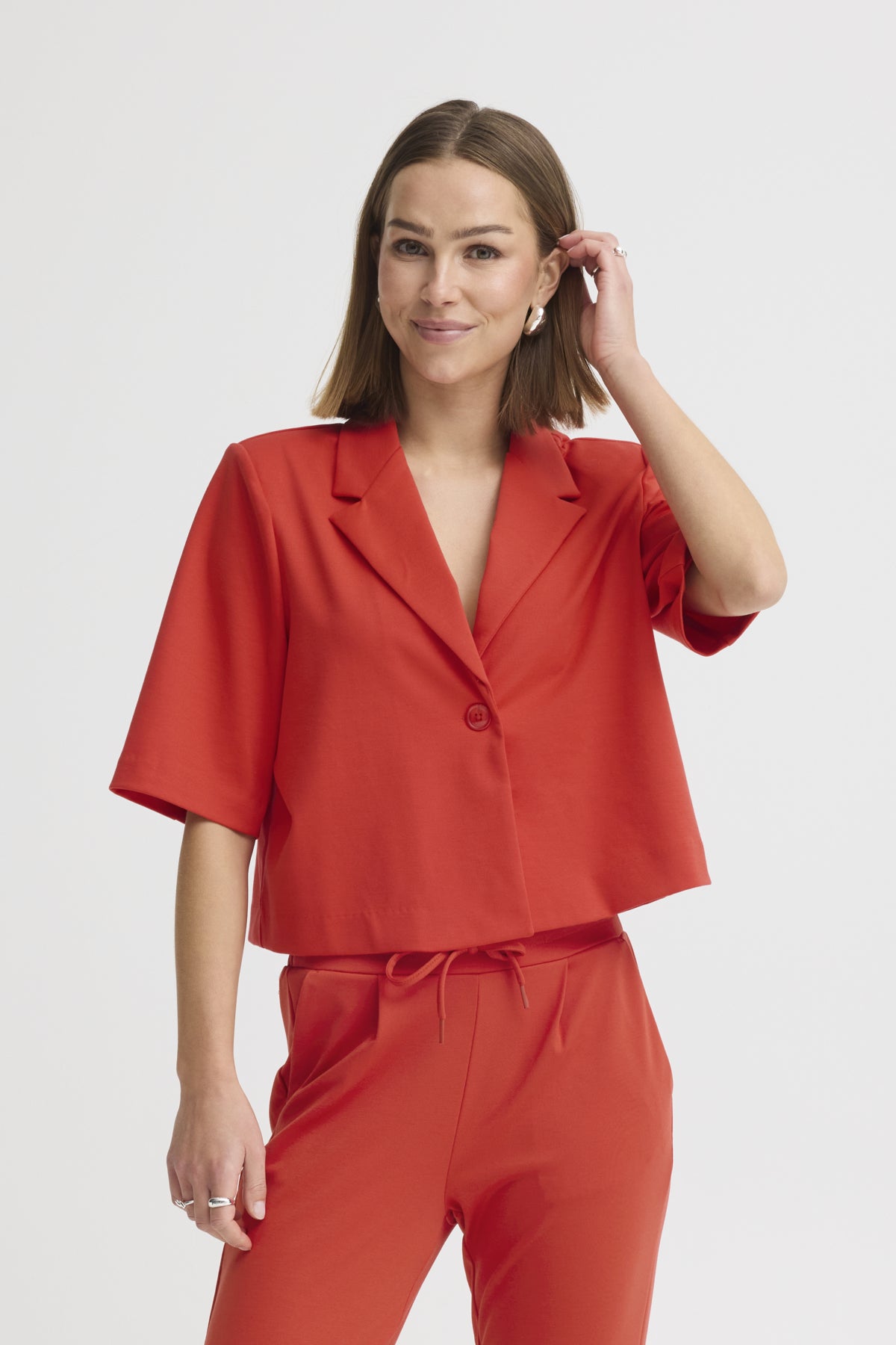 Veston Kate court | Poppy red