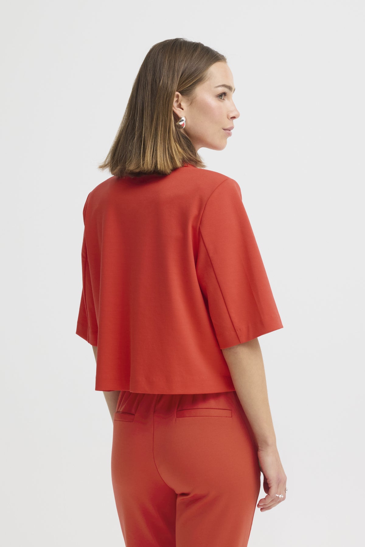 Veston Kate court | Poppy red